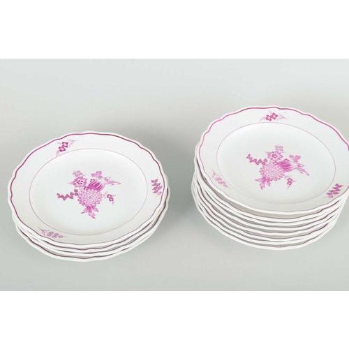 Meissen, Germany 12 deep plates, early 20th century. Set of twelve deep porcelain plates, hand-painted with floral...