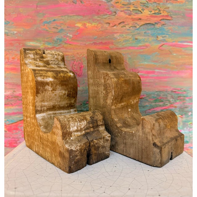 This is an exquisite pair of antique cypress wood corbels, featuring a fabulous curved, hand-carved, design. Masterfully...