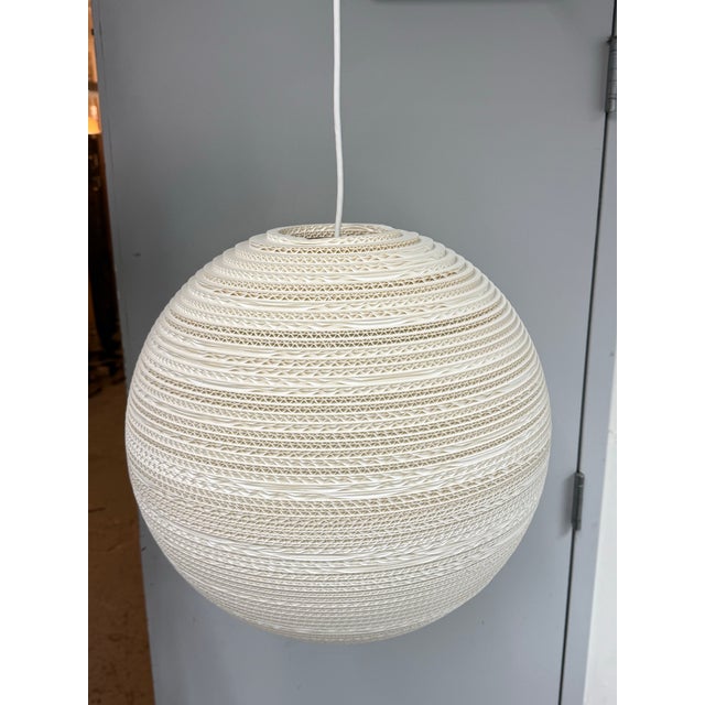 Design Plus Gallery presents the Moon 18 Pendant Light from Graypants. The Moon 18 is part of Graypants’ Scraplights...