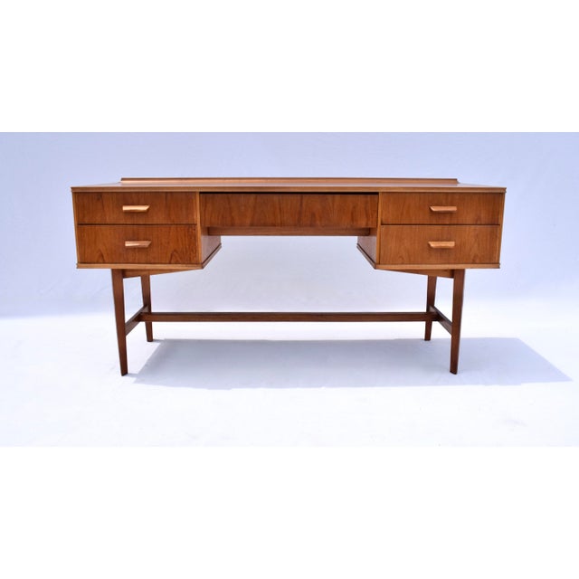Midcentury desk set or work table by English maker Gimson and Slater, retailed by Heals of London. A sleek Danish Modern...