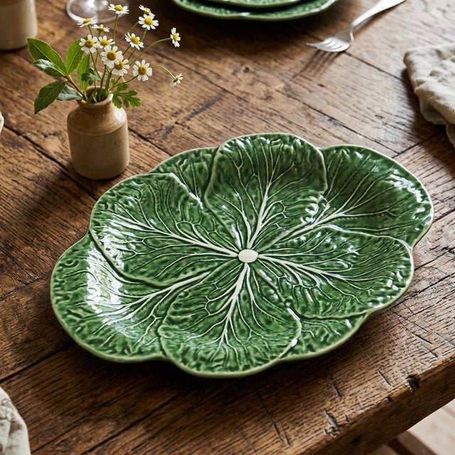 Styled after Bordallo Pinheiro and the richly modeled majolica wares of 19th-century Europe, the oval platter takes the...