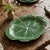 Styled after Bordallo Pinheiro and the richly modeled majolica wares of 19th-century Europe, the oval platter takes the...