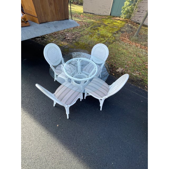 Set of 4 Rattan Wicker Chairs, Glass Table top and Rattan Base All Included DIMENSIONS Chairs W19 x 18D x 37.5H” Seat...