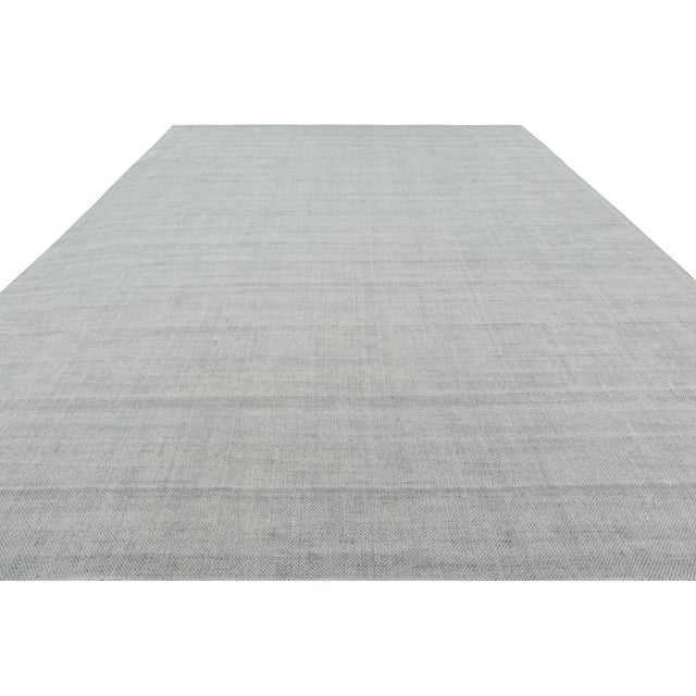 This hand-knotted wool 11x15 rug is a bold new addition to Rug & Kilim’s Textural Collection and represents a series of...