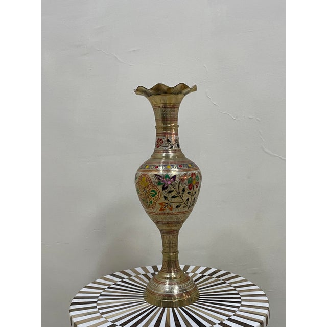 Handcrafted engraved brass vase designed to bring warmth, elegance, and timeless character to any interior. Featuring...