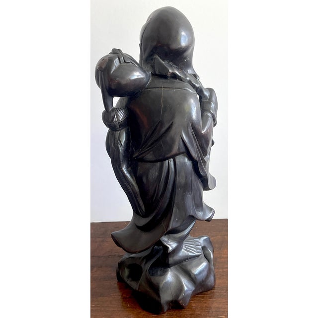 19th Chinese Carved Hardwood Figure of an Immortal Holding a Bat For Sale - Image 9 of 10