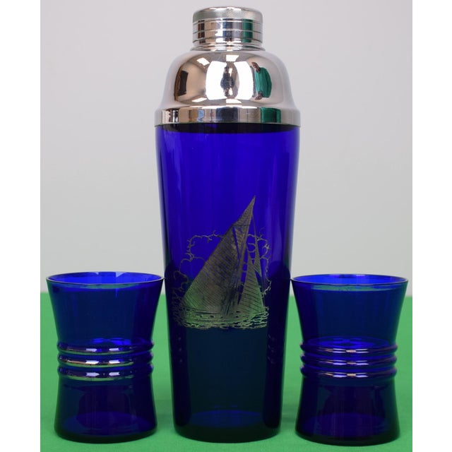 Shaker Sz: 11"H x 3 5/8"D at rim Glasses Sz" 4"H x 3"D at rim The Rockwell Silver Company, established in Meriden,...