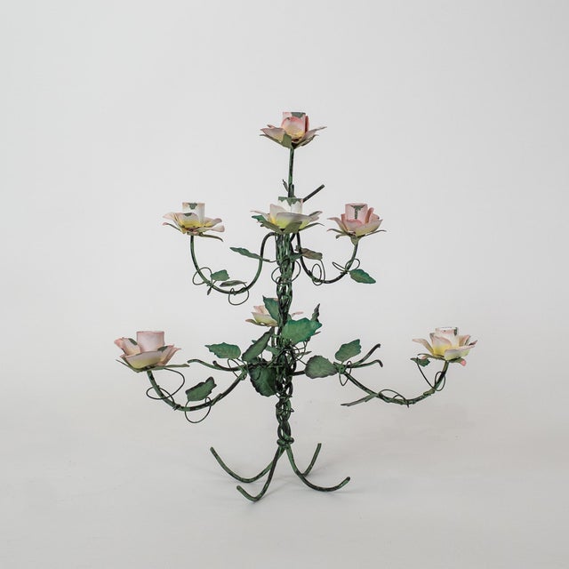 A charming vintage Italian tole floral candelabra dating to circa 1960. Hand wrought and hand painted, this piece features...
