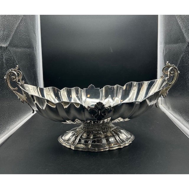 Baroque-style "jatte" centerpiece in 800 silver. It features an elongated and deep shape. The decorations include sinuous...