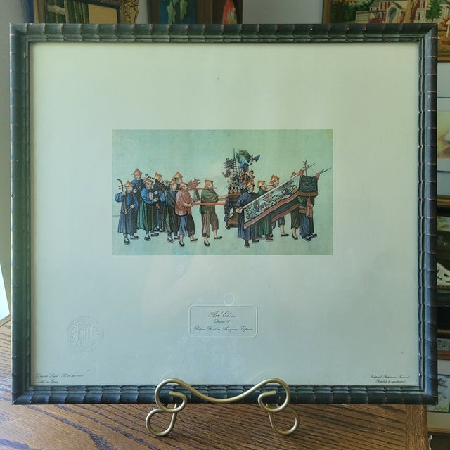 This Chinese art print features a lithographic reproduction of ancient Chinese themes from the year 1974. The print comes...