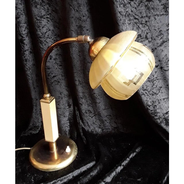 Vintage Art Deco Brass Frame with Cream Colored Plastic and Glass shade Adjustable Desk Lamp, 1930s, in Good conditions....
