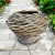 Antique primitive hand woven large basket. Bi-cone shape showcasing naturally aged-patina loaded up on timeless character....