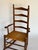 American 1900s Antique Ladder Back Brown Rocking Chair For Sale - Image 3 of 10