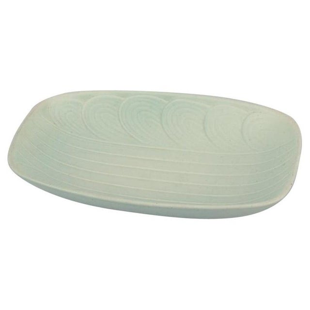 Rörstrand, Sweden. Large ceramic bowl in a modernist design. Rare model. Glaze in light green tones. Mid-20th century....