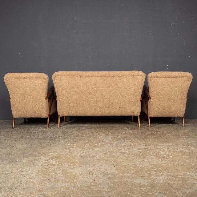 A beautiful set of mid 20th Century Italian armchairs and sofa by Paulo Buffa. These pieces showcase impeccable quality,...