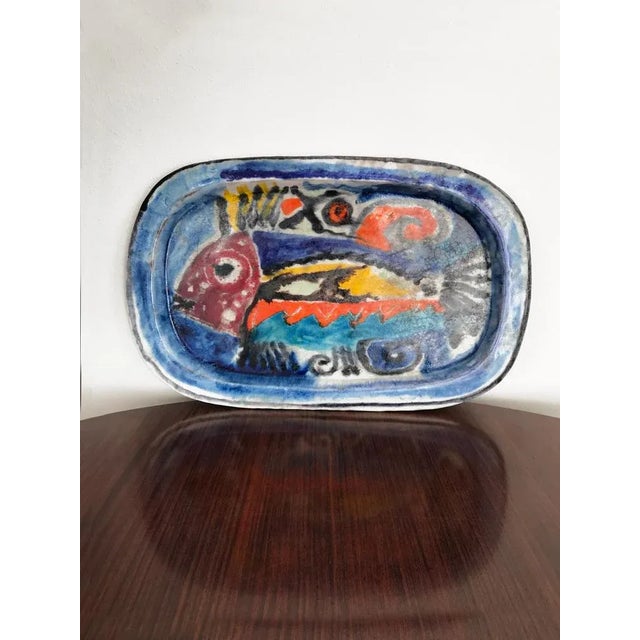 Planning or centerpiece in hand decorated ceramic designed by the Italian artist Giovanni De Simone and produced by his...
