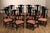 High Quality Set Of Twelve Custom Black Lacquered Dining Chairs Featuring Tall Shaped Backs, Curved Arms, And Upholstered...