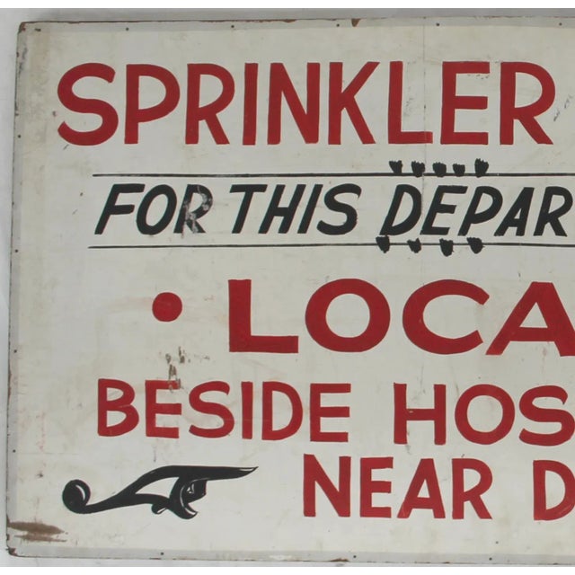 Circa 1940s one-sided and hand-painted on masonite red, white and black factory sign from the Syracuse, NY area. Sign has...