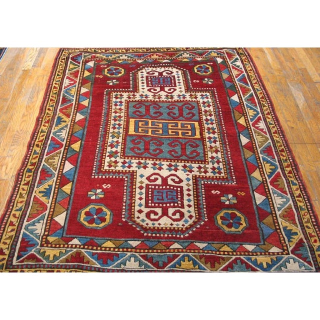 Antique Caucasian - Kazak rug, size:4'4" x 5'3". This early twentieth-century Caucasian Kazak rug is a powerful...