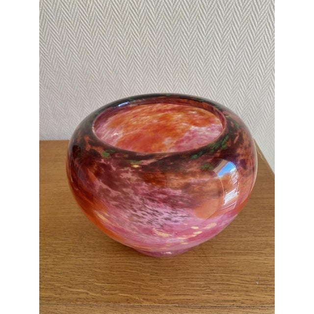 This exquisite Art Deco glass vase, signed by renowned French master glassmaker Charles Schneider (1881–1953), is a...