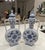 These are a vintage Pair of blue and white Chinese moonflasks from the mid 20th century. Inspired by the Ming Dynasty's...