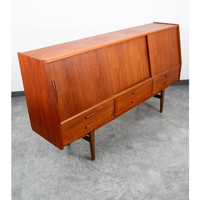 Restored near time capsule teak credenza or sideboard by unknown Danish designer . Nice large size that allows for use as...