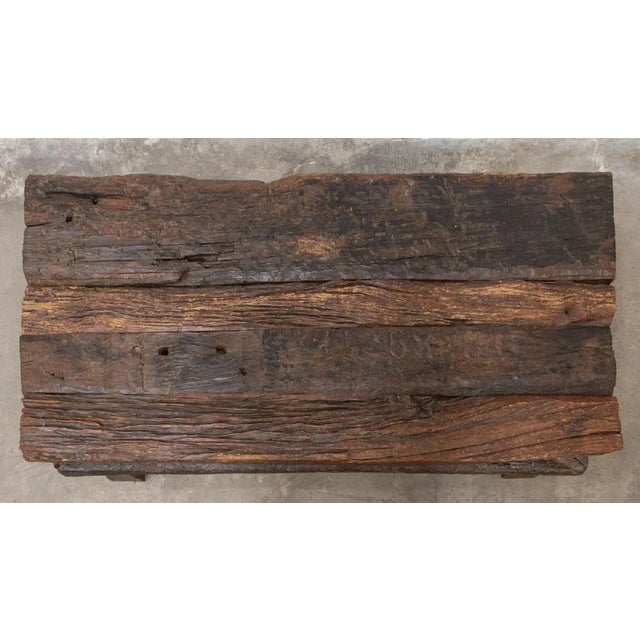 Handcrafted coffee table The top is made from old, aged oak railway sleepers, with deep cracks caused by time and weather...