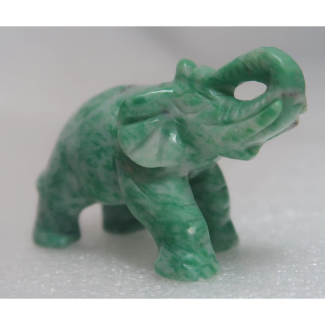 Hand-carved miniature elephant of Amazonite,, an uncommon stone. It is one of a collection of precious and semi-precious...