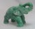 Hand-carved miniature elephant of Amazonite,, an uncommon stone. It is one of a collection of precious and semi-precious...