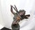 An Art Nouveau figure of a Pixy girl with wings playing the Violin . A Highly detailed metal casting in metal with multi...