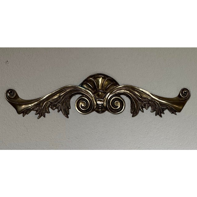 Design • nthus Leaves (Neoclassical): The stylized, feathered foliage spreading outward from the center mimics the classic...