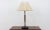 This Model Giso 5020 table light was designed by W.H. Gispe in 1947. It features a round Bakelite base with a push switch,...