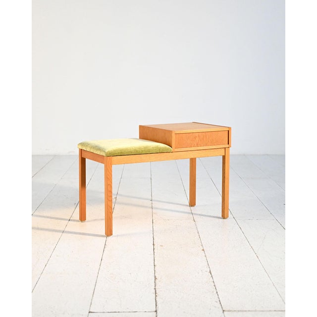 Oak gossip chair with integrated drawer and green velvet upholstered seat. Scandinavian production, 1960s. Known in...