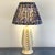 Speckled creamy MidCentury ceramic base with a gather pleated lampshade. Lamp base diameter 4” Height to top socket 12”...