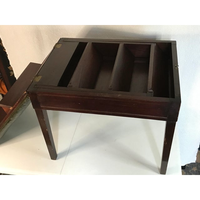 A truly unusual and wonderfully designed antique piece from the 1930s — at first glance a charming upholstered bench seat,...