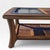 A substantial late 20th-century coffee table crafted from oak with a deep, expressive grain and architectural smoked glass...