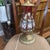 Antique Hand painted Cranberry Glass Lamp that has rosebuds all around the bottom.This appears to be an antique Venetian...