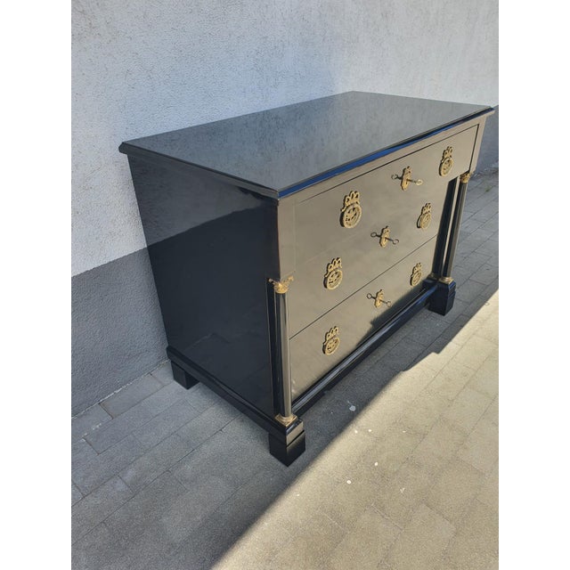 Original Biedermeier cherrywood chest of drawers, expertly ebonized. This beautifully shaped chest has three drawers with...