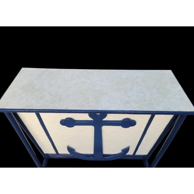A completely customized one of a kind nautical Coastal rattan, wood dry bar. The bar has been freshly painted in a classic...