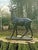 An impressive life-size cast iron stag sculpture, beautifully modelled in a proud standing pose with an imposing set of...