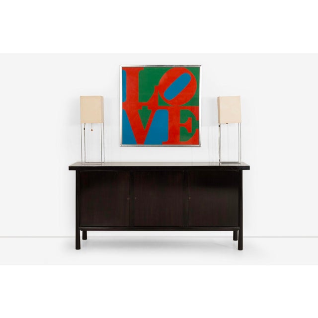 T. H. Robsjohn Gibbings Cabinet for Widdicomb, 1950's This elegant cabinet, designed by T.H. Robsjohn Gibbings for...