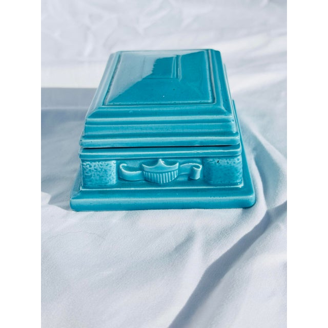 Striking vintage ceramic trinket box produced using an Atlantic Mold, finished in a rich turquoise glaze with clean,...