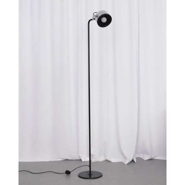 The lamp of the famous Italian brand Stilnovo comes from the 70s. It is made of metal - it has a black matte body and a...