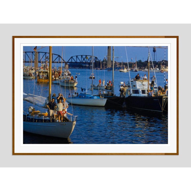 Boats and Bridges by Toni Frissell Boats gather in a harbour near the infamous Gold Star Bridge for the Harvard-Yale...
