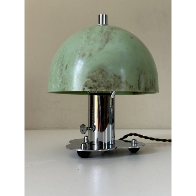 A very beautiful Art Deco style lamp dating from the 1950s, signed Ikora WMF, with a rotary switch on the stem and a...