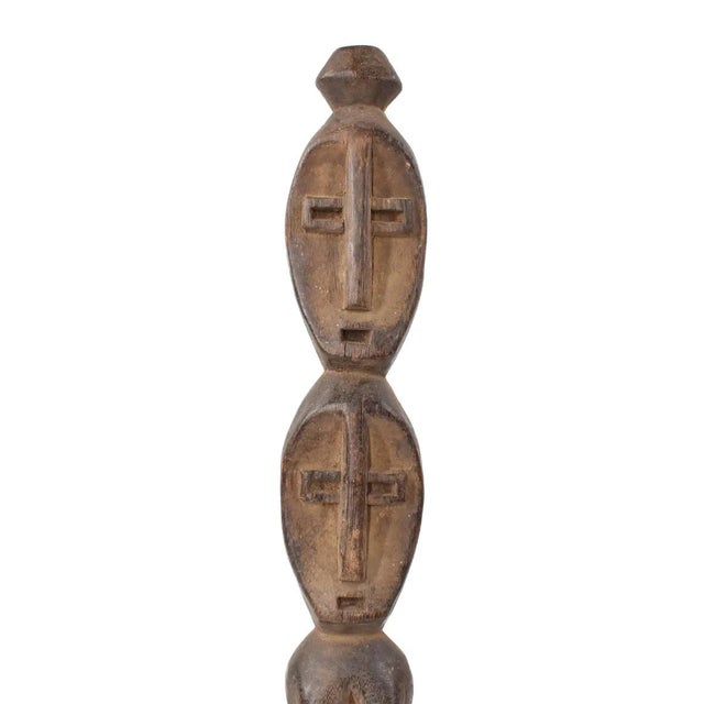 Hand-carved Lega figure originates from the Lega people in the Democratic Republic of the Congo. The figure is easily...