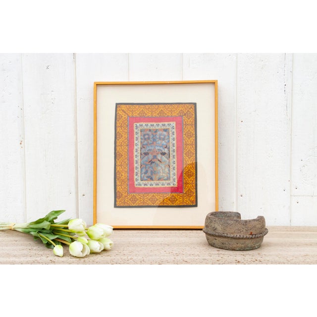 This framed textile offers a fascinating glimpse into Imperial China's intricate system of social hierarchy. This piece is...