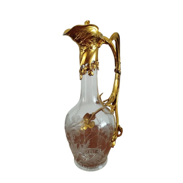 - Art Nouveau wine jug decanter, Western Europe, likely France, ca. 1900–1910 - Hand-engraved glass and gilt brass mounts...