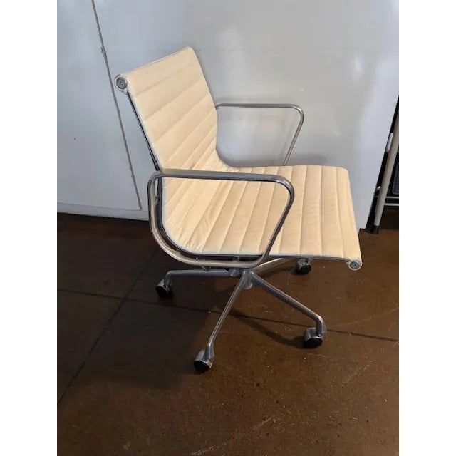 White Leather Eames Associate office chair. Extremely comfortable. Adjustable seat.