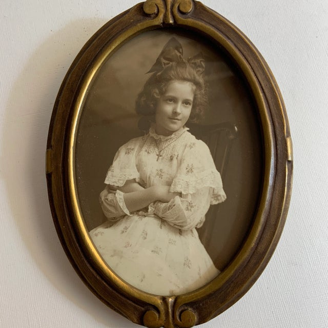Lovely Art Deco style oval portrait frame with Vintage image of a girl. Nice for a child's room.
